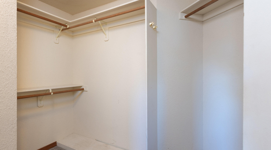 upstairs bedroom walk in closet