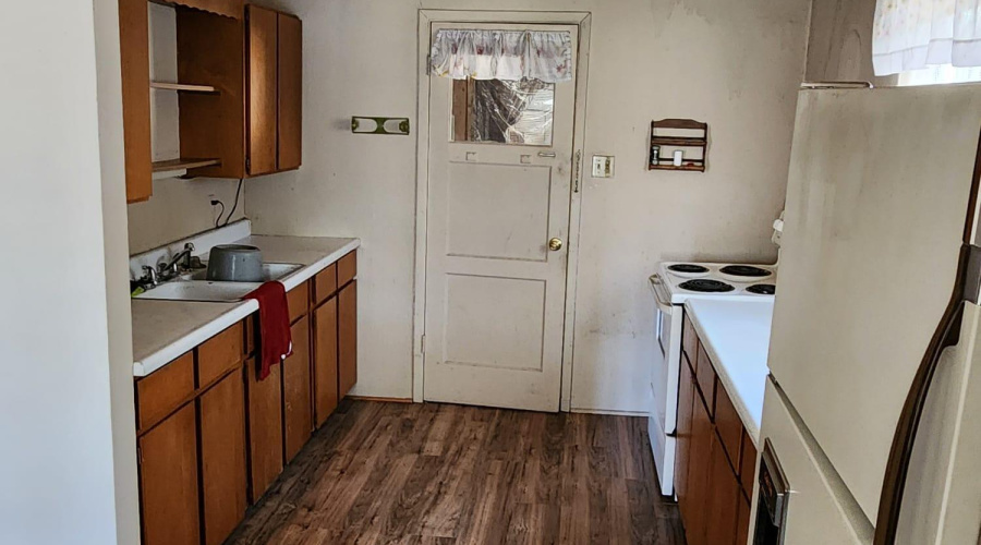 Kitchen with door to utility room
