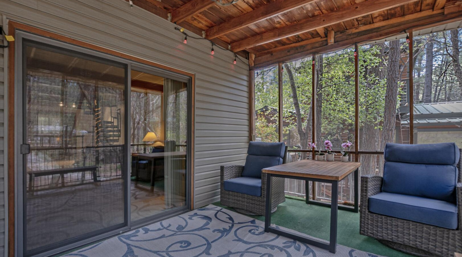 screened patio over the creek
