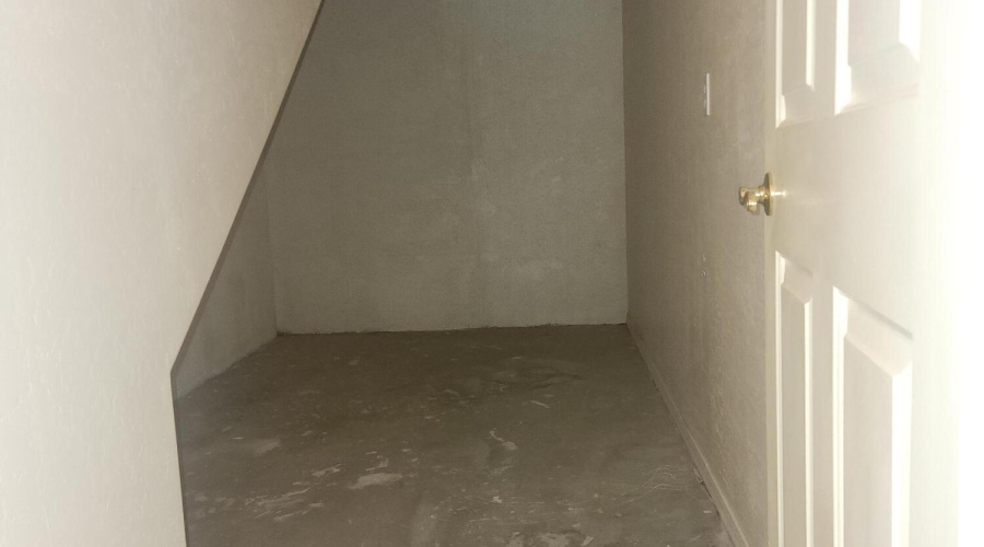 Room under stairs