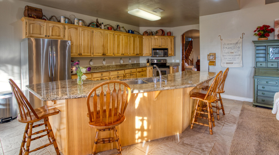 Huge Island Opens to Living Room