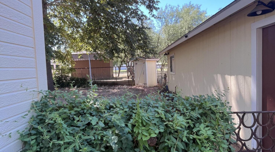 Back yard entry between garage and home