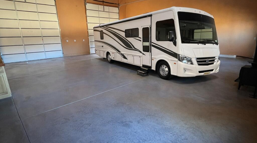Spacious garage with parked motorhome