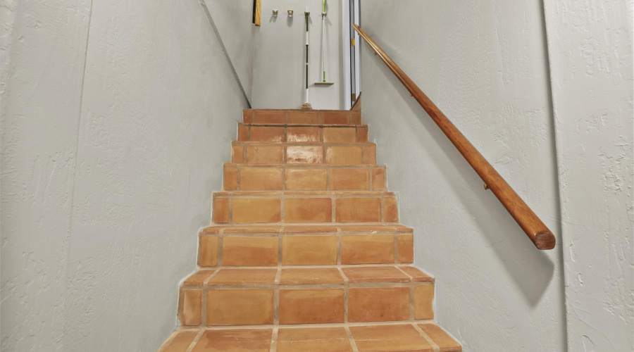 Split stairs to garage and basement