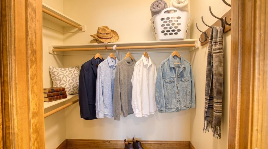 Spacious Closet Behind Sliding Barn Door
