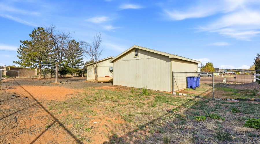 Back yard facing garage