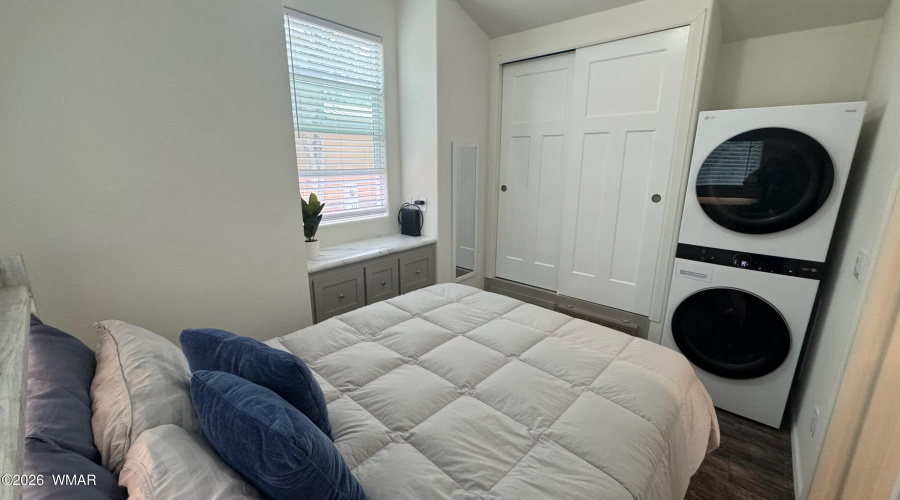 Stackable Washer Dryer in Bedroom