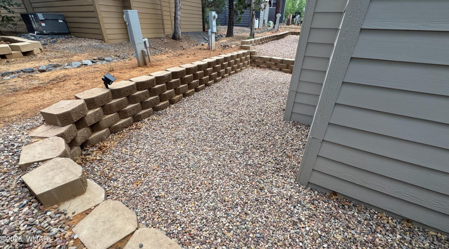 Stacked Block Fence around Perimter