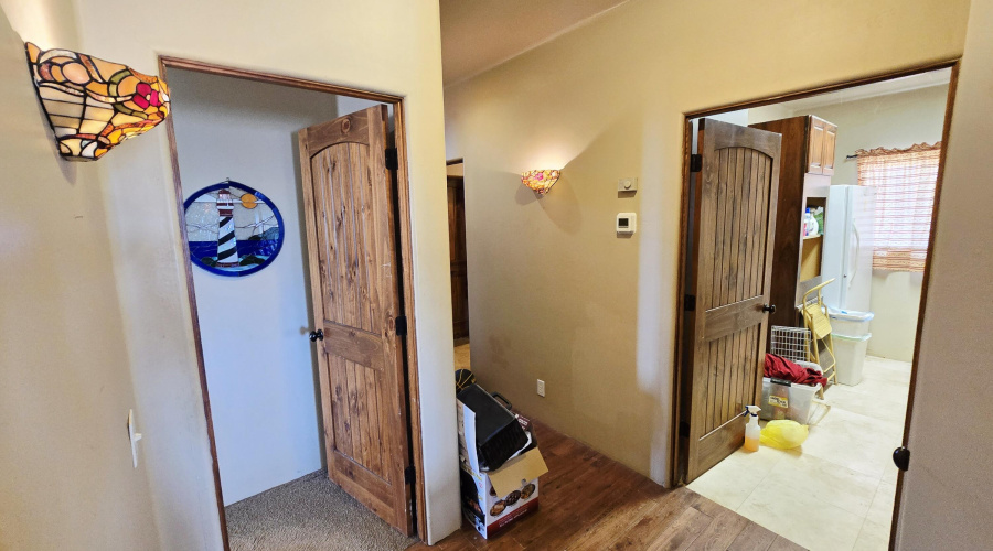 Hallway to primary/laundry room