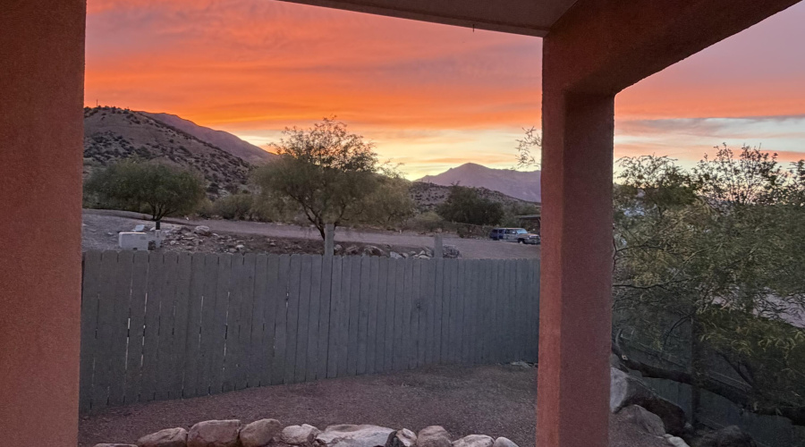 view of sunset from patio