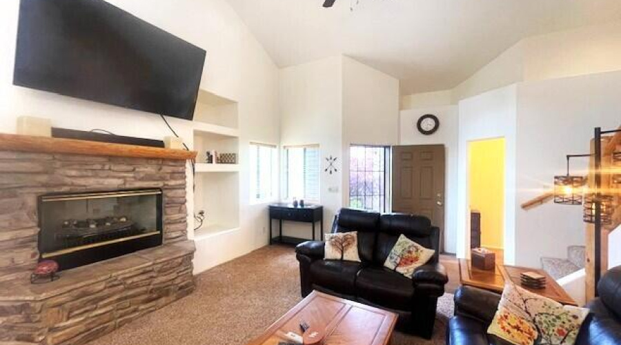 Tv Living room looking towards front doo