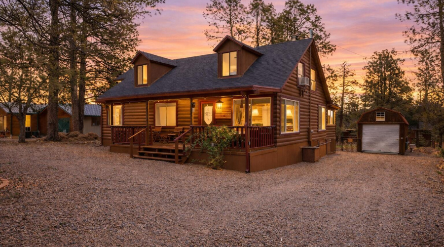 Twilight at a cozy log cabin