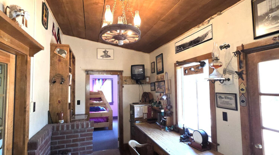 den leading to bunkroom