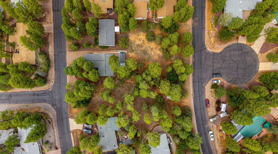 Aerial View of home plus 3 lots