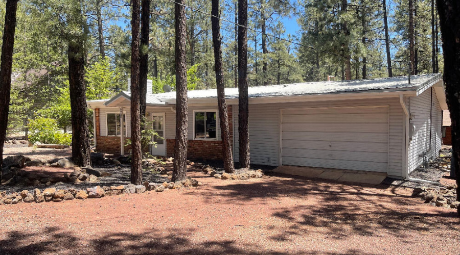 8239 Bucksprins Rd Front w Garage 1