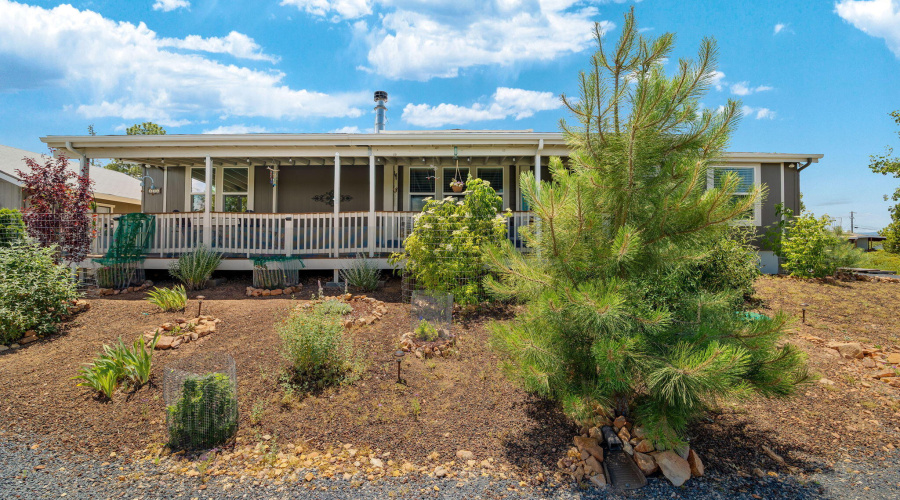 front of home beautifully landscaped